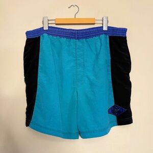 Vintage Surf Odyssey Vibrant Aqua & Black Men's Colour Blocked Swim Trunks